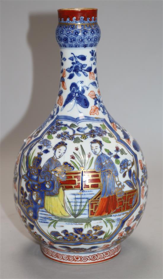 A 19th century Chinese blue and white vase, with clobbered decoration 24cm.